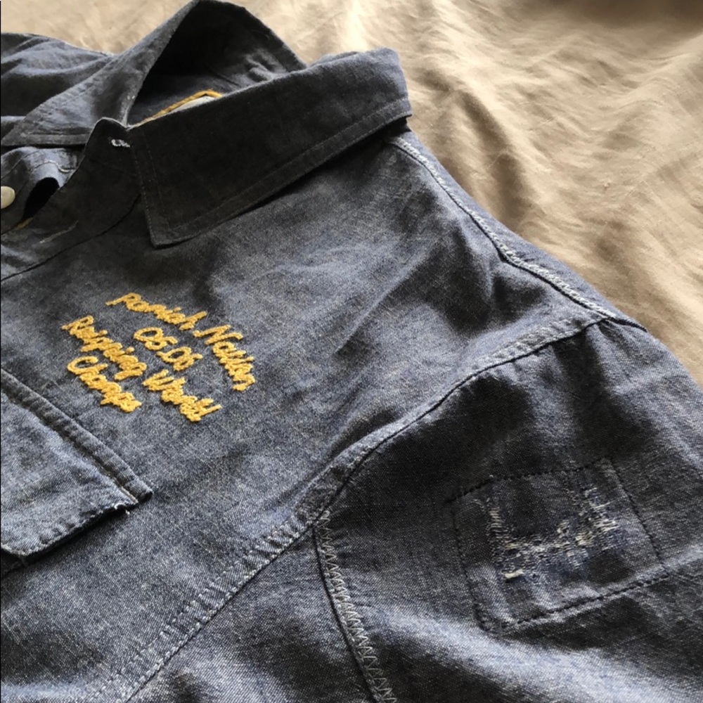 Men’s distressed denim button up shirt